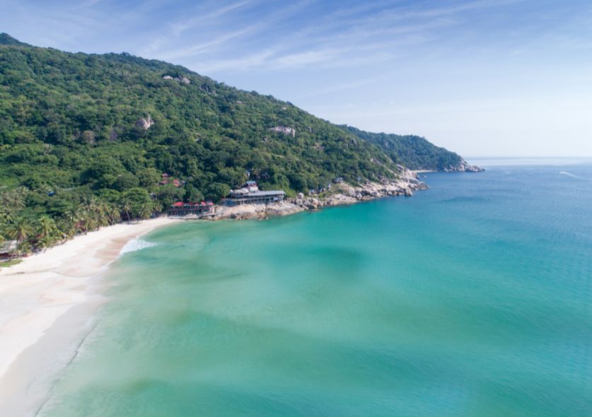 Haad Rin beach during the day is a tropical paradise