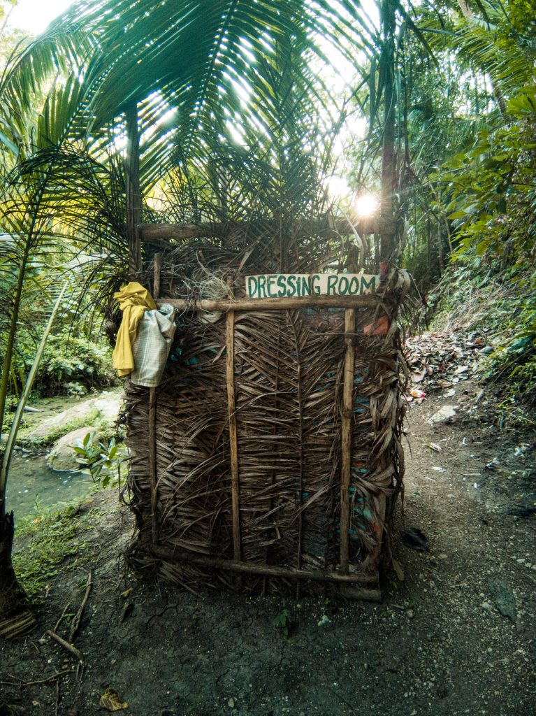 A makeshift Filipino changing room made of all kinds of materials