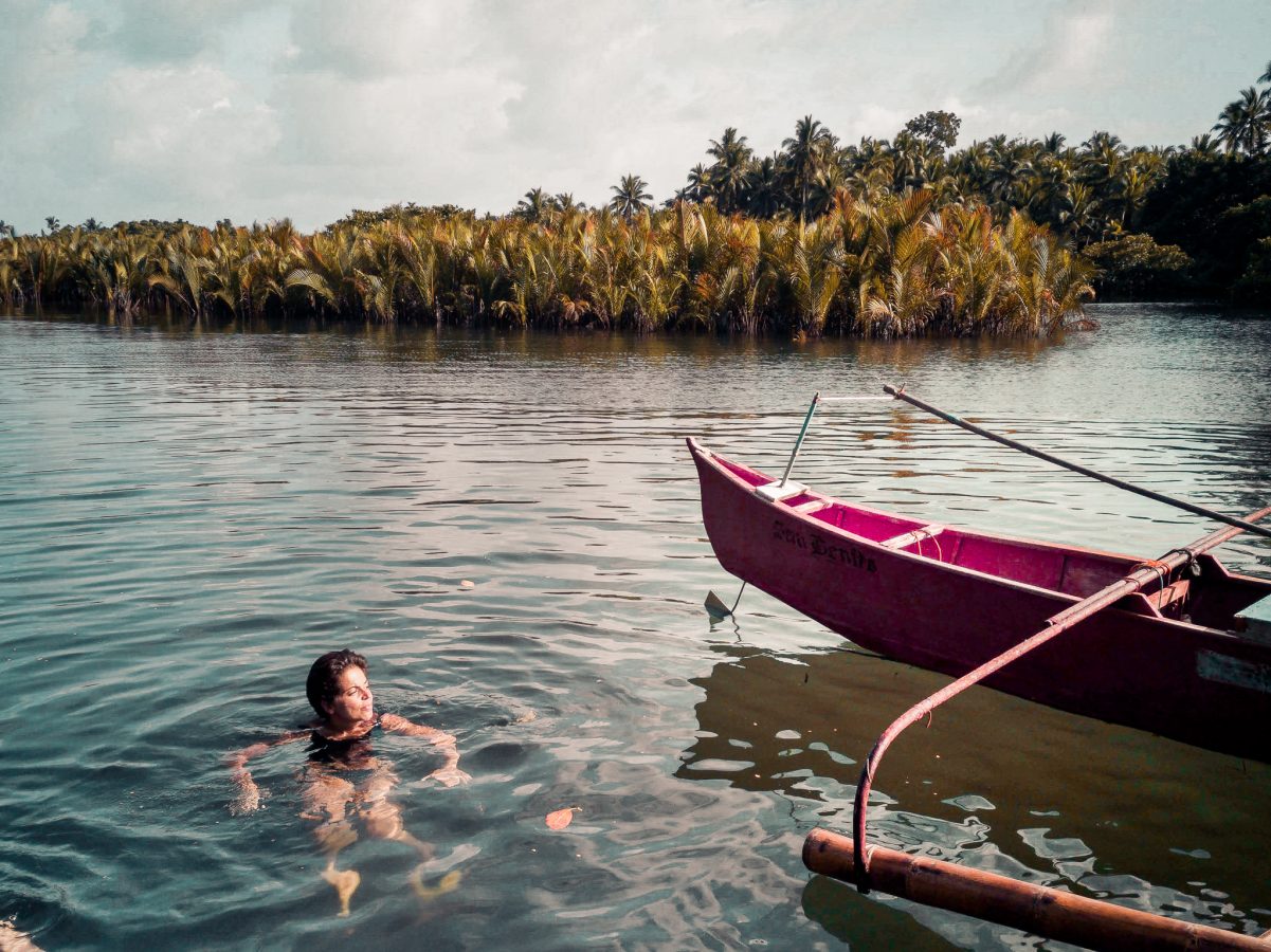 Jacqueline takes a dip in the water of the Lagoon