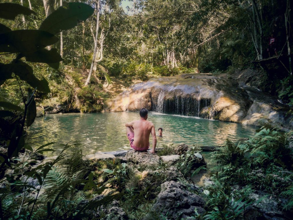 We sat here on the edge of the pool surrounded in jungle while our guide snapped a few photographs