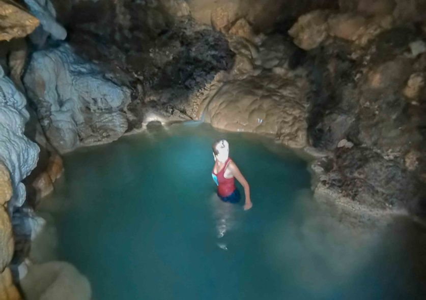 Jacqueline inside a pool in cantabon cave