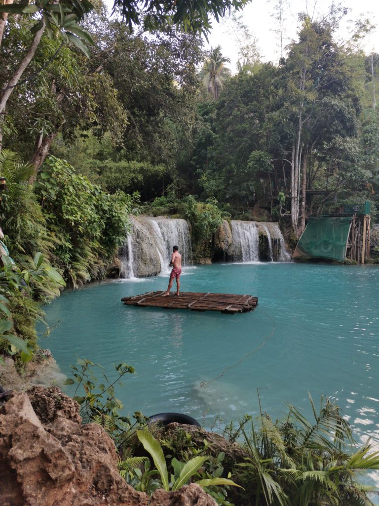 James on the barge heading for a relaxing shower under Cambugahay falls