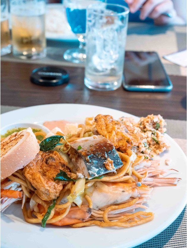 A plate full of food from a buffet