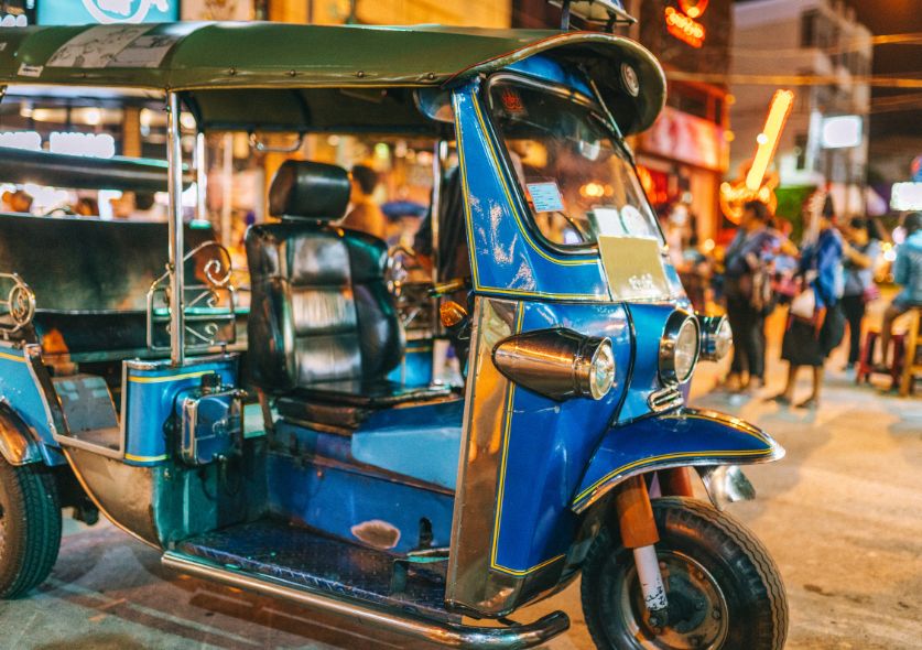 Suvarnabhumi airport to Pattaya. The iconic Thailand tuk tuk a motorbike taxi with 3 wheels