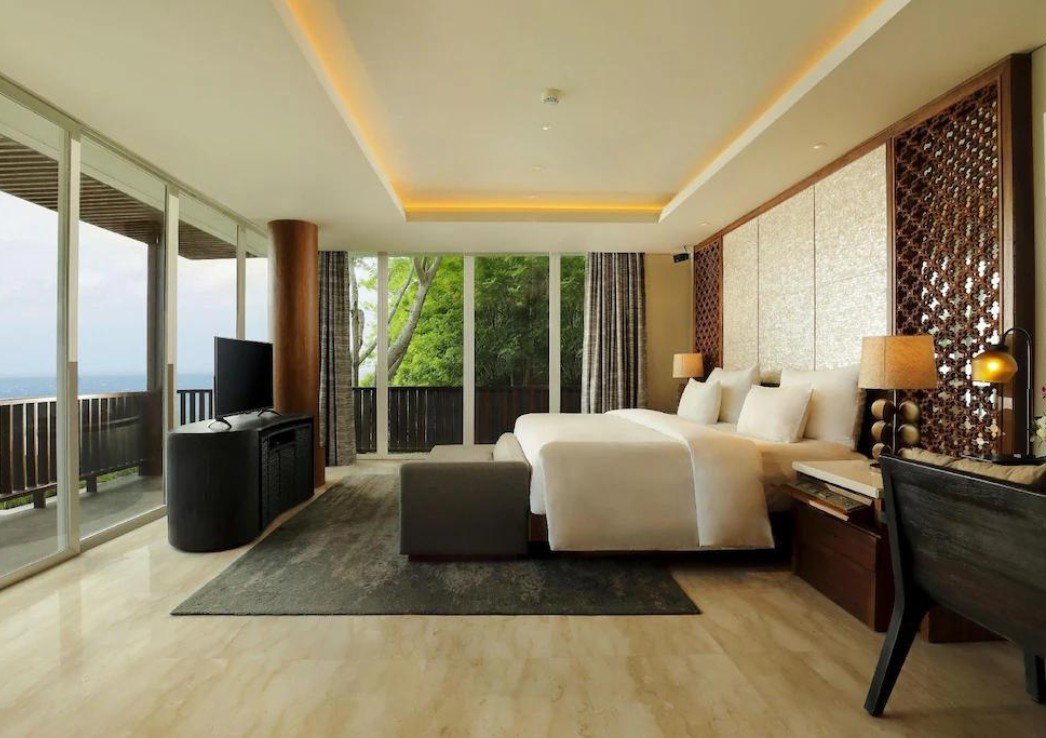 A suite with luxury furnishings and a terrace