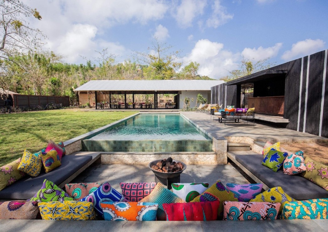 Best hotels in Bali uluwatu - a pool with tent rooms around it