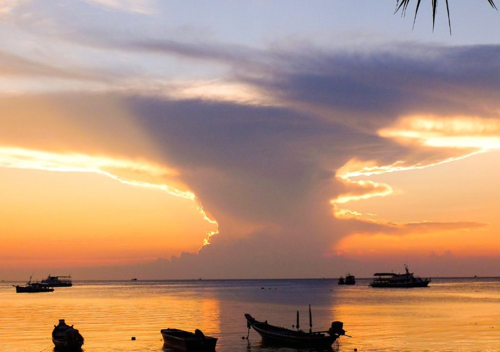 a sunset over the ocean